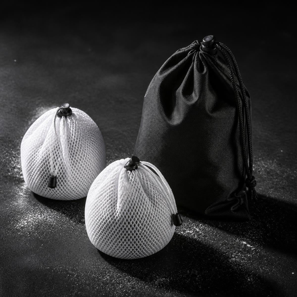 Two BasePlate mesh chalk balls with black storage pouch
